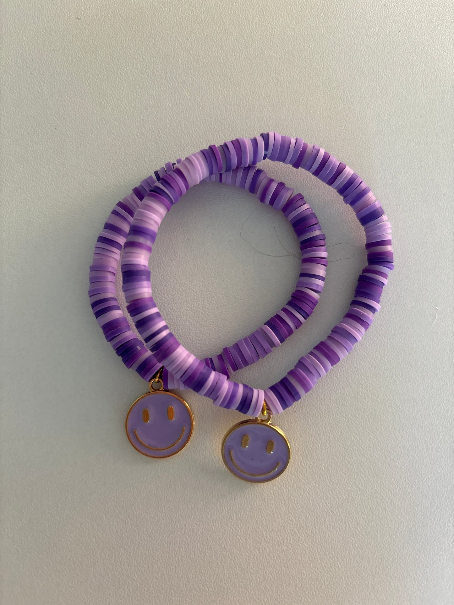 Purple smiley face bracelet