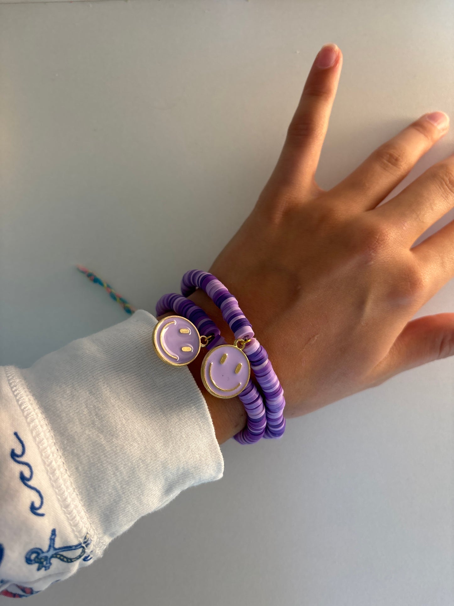 Purple smiley face bracelet